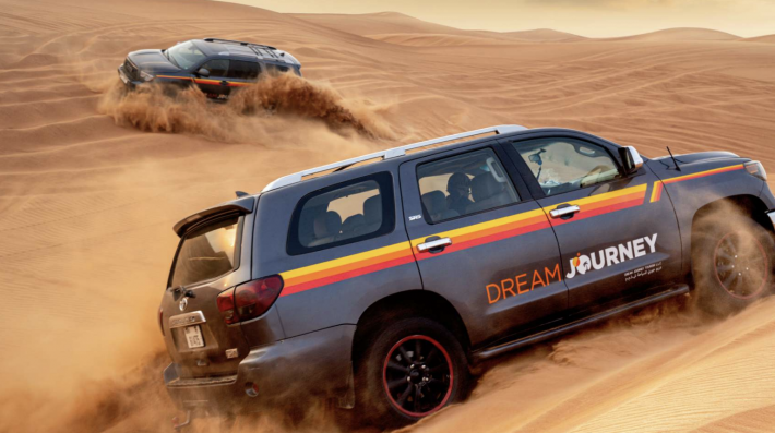 Dubai Desert Discovery: Red Dunes Safari, Sandboard & Camel Ride